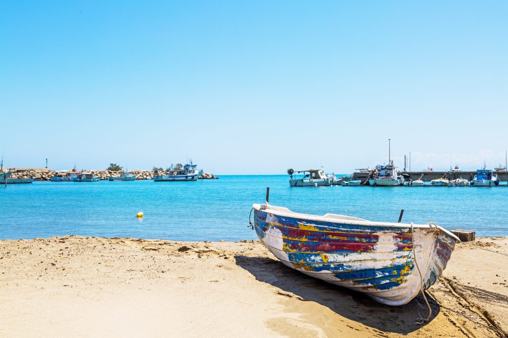 Old Row Boat on Beach in Italy
